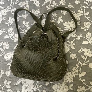 Leather woven backpack with drawstring